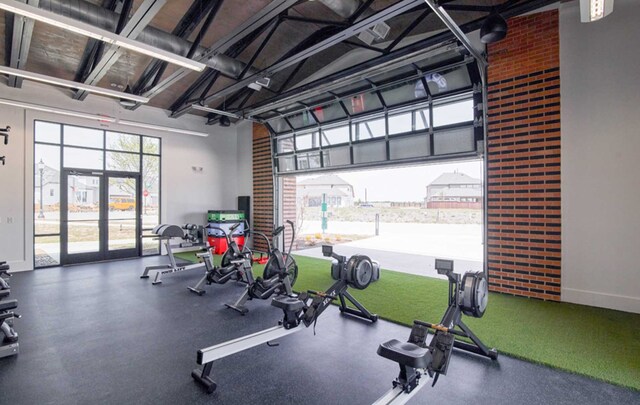 exercise room with golf simulator