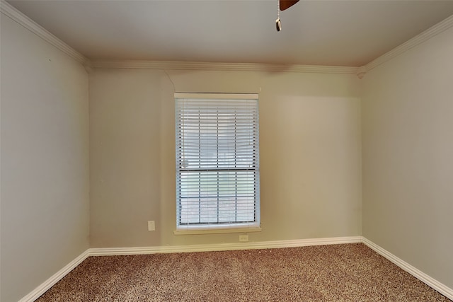 unfurnished room with ornamental molding and carpet flooring