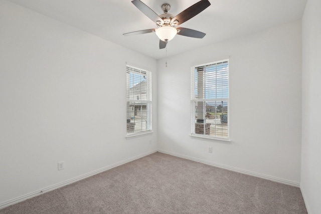 2402 Bulin Dr, Mansfield, TX 76063 - spare room featuring baseboards, carpet floors, and a ceiling fan