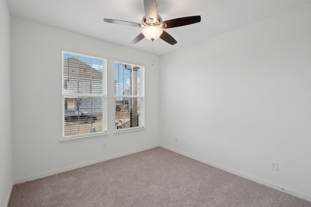 2402 Bulin Dr, Mansfield, TX 76063 - spare room with baseboards, carpet flooring, and a ceiling fan