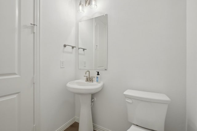 2402 Bulin Dr, Mansfield, TX 76063 - half bath with toilet and baseboards