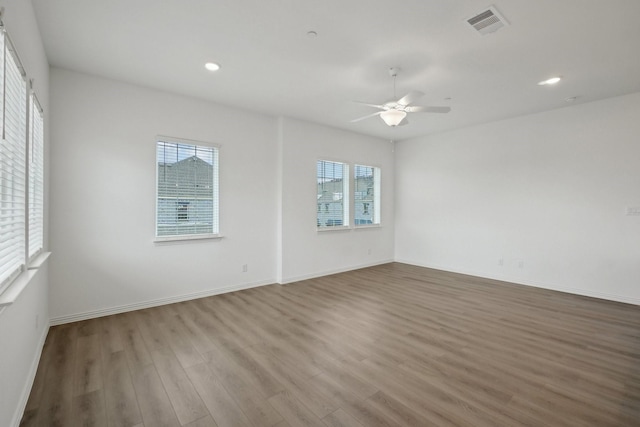 2402 Bulin Dr, Mansfield, TX 76063 - spare room with a ceiling fan, recessed lighting, baseboards, and wood finished floors