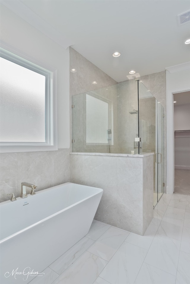 2129 Pecan Square Ave, Shreveport, LA 71106 - bathroom featuring a shower stall, a soaking tub, recessed lighting, and marble finish floors