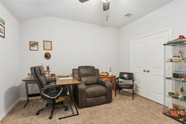 office area featuring ceiling fan, lofted ceiling, and light carpet