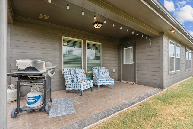 view of patio with a grill