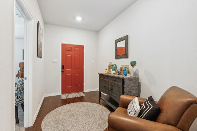 sitting room featuring dark hardwood / wood-style flooring