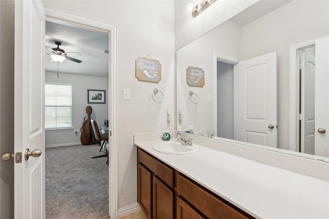 bathroom featuring vanity and ceiling fan