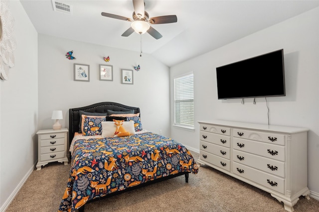 carpeted bedroom featuring ceiling fan and vaulted ceiling