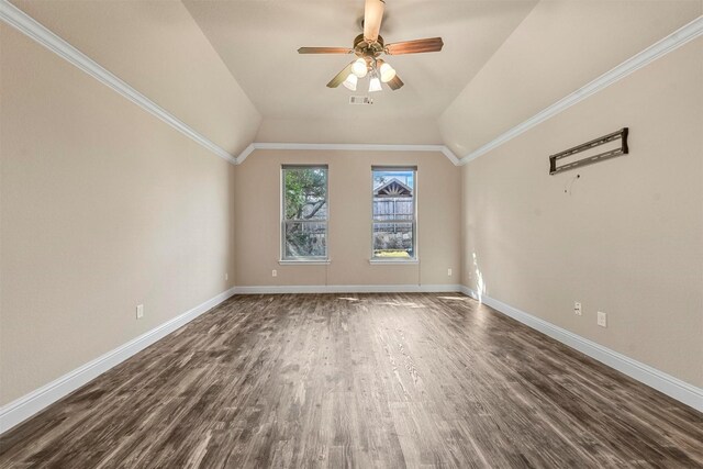 unfurnished bedroom featuring hardwood / wood-style flooring, ornamental molding, and lofted ceiling