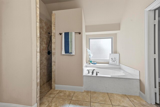 bathroom featuring tile patterned flooring and vanity