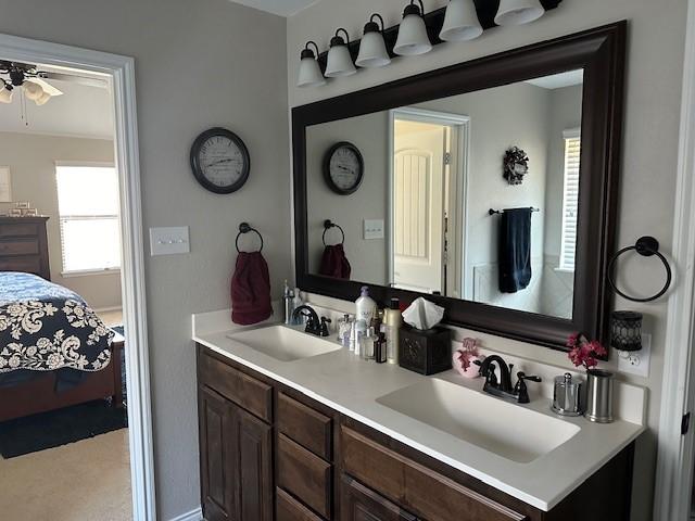 bathroom with vanity and ceiling fan