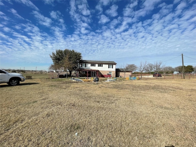 view of yard featuring fence