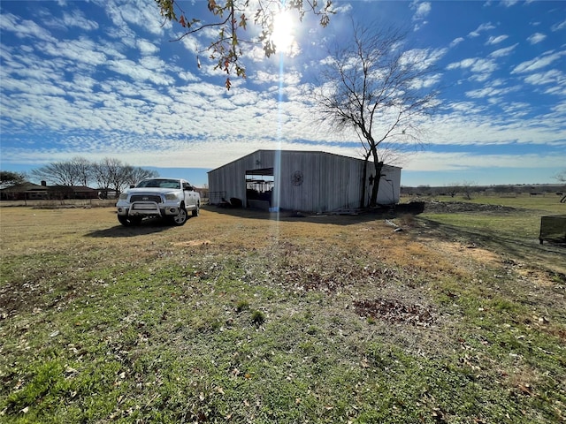exterior space with an outbuilding and a pole building