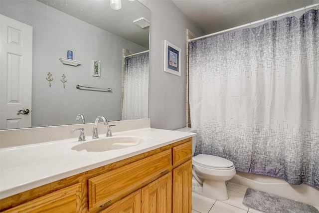 full bathroom featuring tile patterned flooring, vanity, toilet, and shower / tub combo with curtain