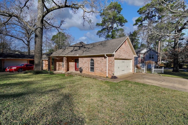 view of front facade with a garage and a front lawn