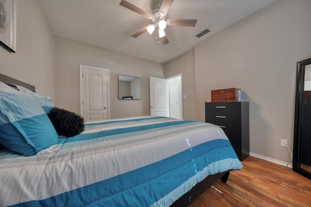 bedroom featuring wood-type flooring and ceiling fan