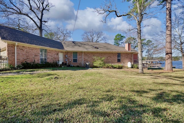 view of front of property with a front lawn