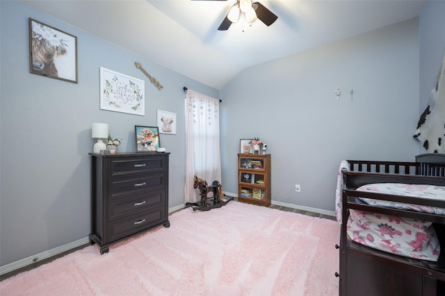 bedroom with carpet, ceiling fan, and lofted ceiling