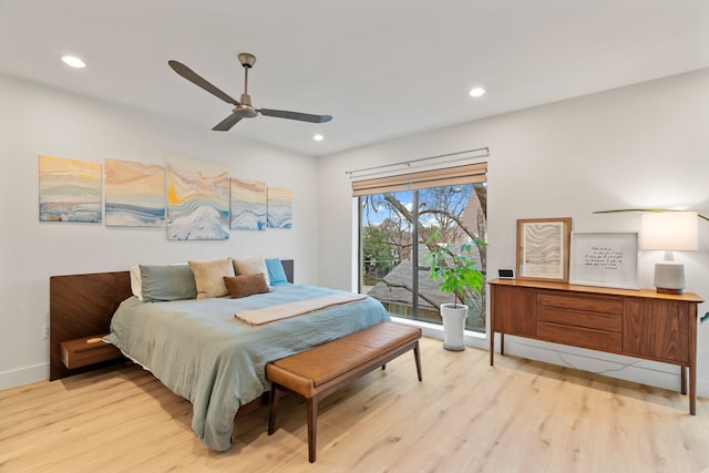 bedroom featuring access to outside, ceiling fan, and light hardwood / wood-style floors