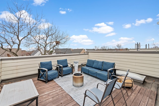 deck with an outdoor hangout area