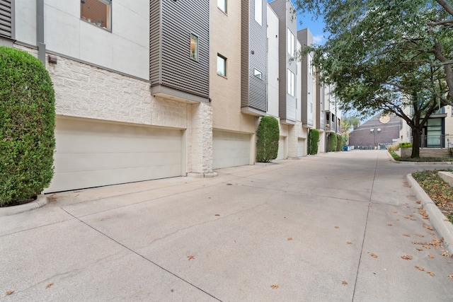 exterior space with a garage