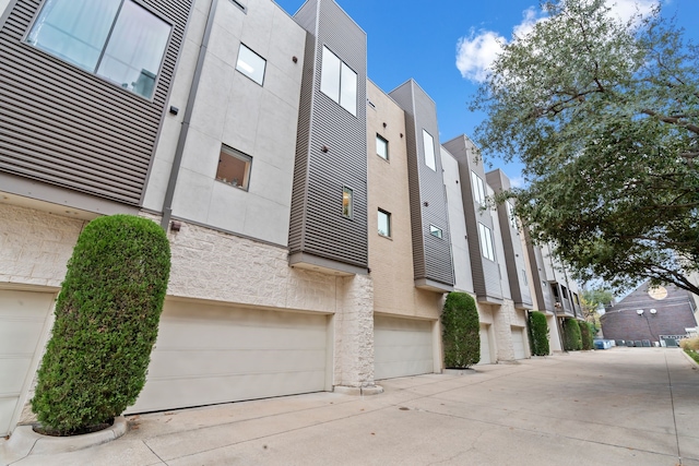 4111 Newton Ave Unit 2, Dallas, TX 75219 - view of building exterior with a garage