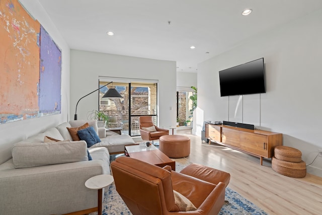 living room with light hardwood / wood-style floors