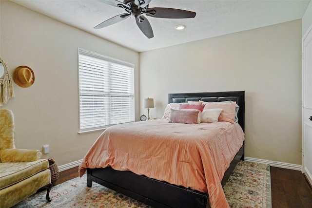 bedroom featuring ceiling fan and wood-type flooring