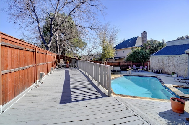 view of pool featuring a deck