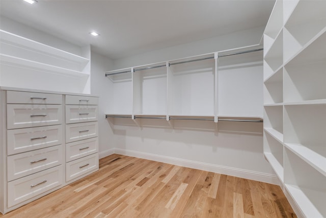 walk in closet featuring light wood-type flooring