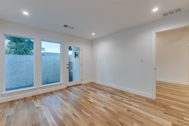 empty room featuring light hardwood / wood-style floors