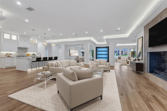 living room featuring light wood-type flooring