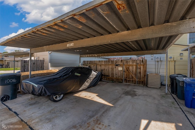 view of parking / parking lot with a carport