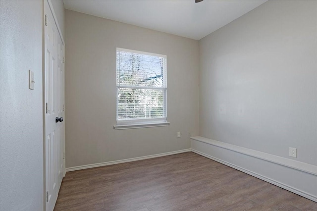 spare room with light wood-type flooring