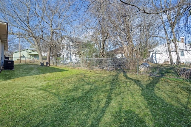 view of yard with central AC