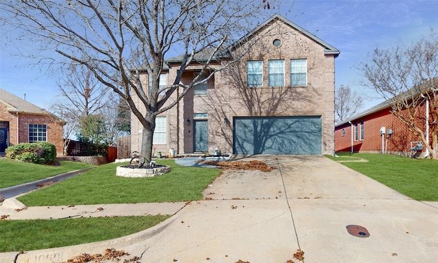 view of front of property with a garage and a front yard