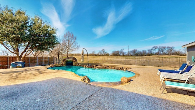 view of pool with a patio