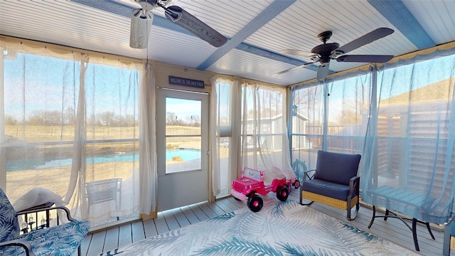 sunroom / solarium with ceiling fan