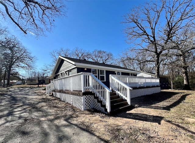 view of front of house with a deck