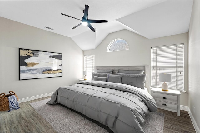 bedroom with wood-type flooring, vaulted ceiling, and ceiling fan