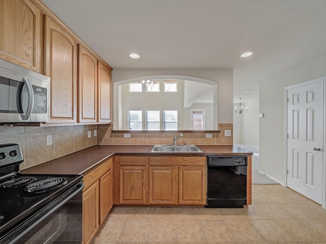 kitchen with black appliances, decorative backsplash, kitchen peninsula, sink, and light tile patterned floors