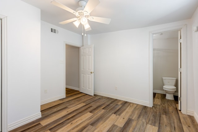 unfurnished bedroom featuring wood-type flooring and ceiling fan