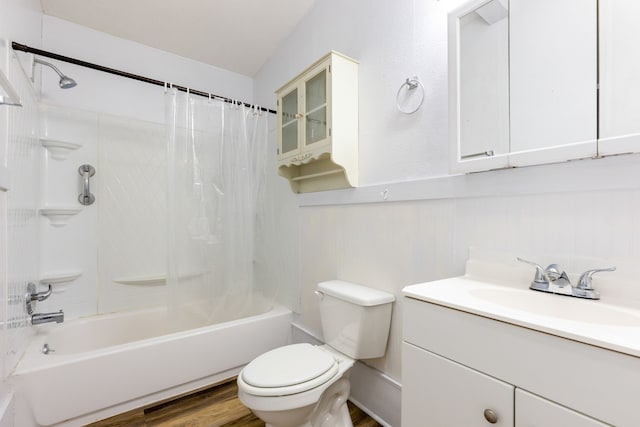 full bathroom with vanity, wood-type flooring, shower / bathtub combination with curtain, and toilet