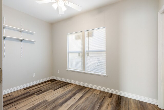 unfurnished room featuring hardwood / wood-style flooring and ceiling fan