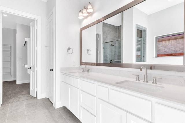 bathroom featuring vanity, tile patterned floors, and an enclosed shower