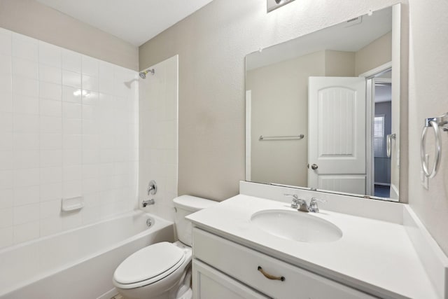 full bathroom featuring vanity,  shower combination, and toilet