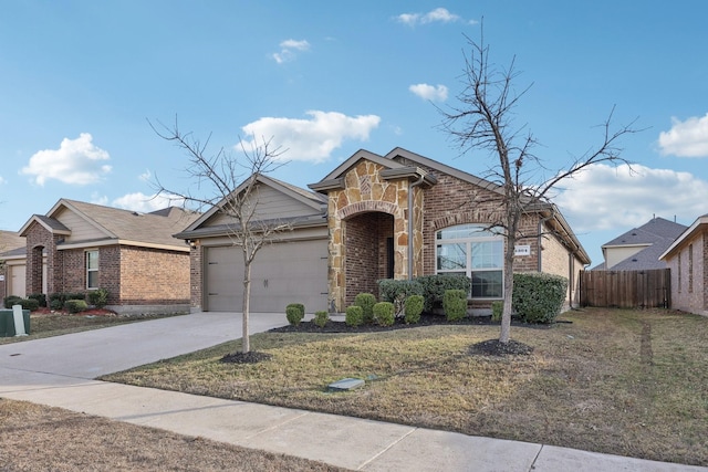 view of front facade featuring a front yard and a garage