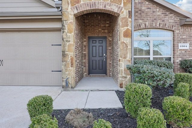 property entrance featuring a garage