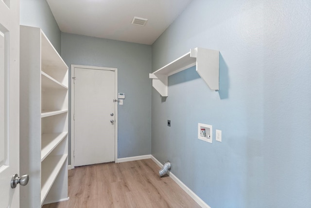 laundry area with washer hookup, light hardwood / wood-style flooring, and electric dryer hookup