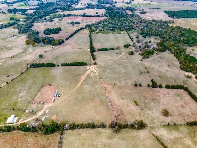 birds eye view of property featuring a rural view